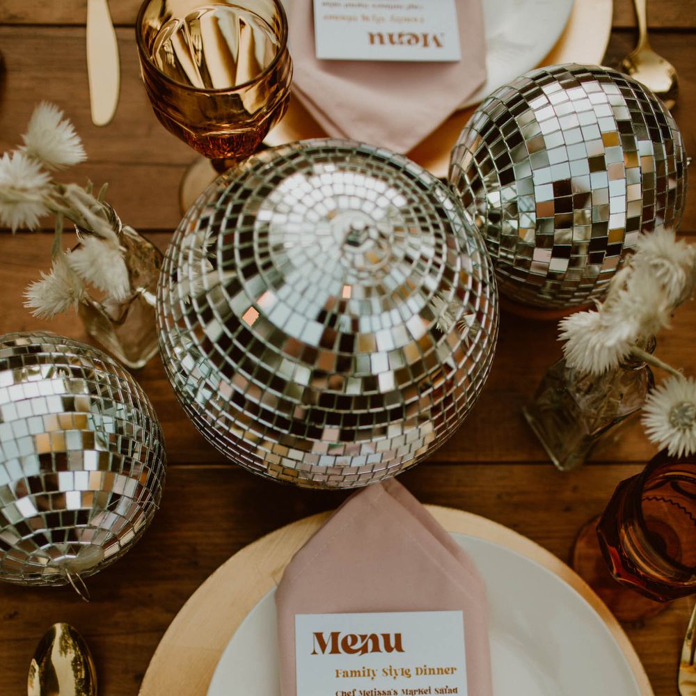 Disco balls and pink table place setting 