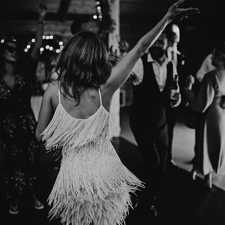 Bride in Short Tasselled Engagement Party Dress Dancing