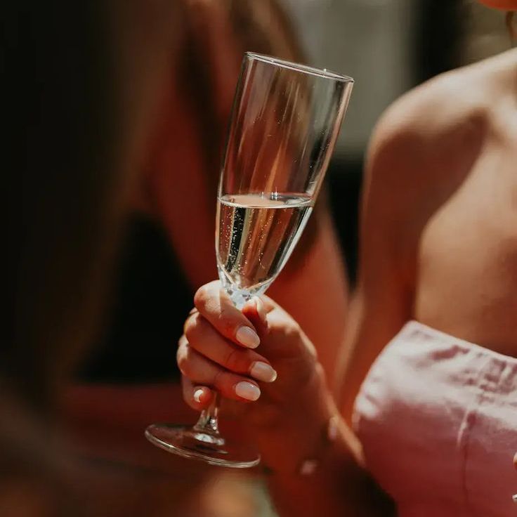 Wedding Guest Drinking Champagne For Wedding
