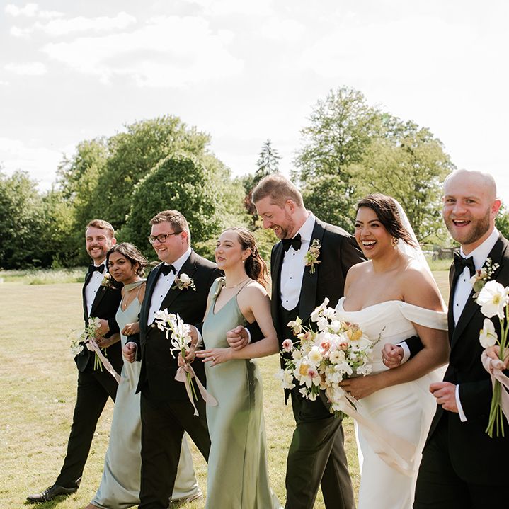 bridal-party-in-sage-green-satin-bridesmaid-dresses