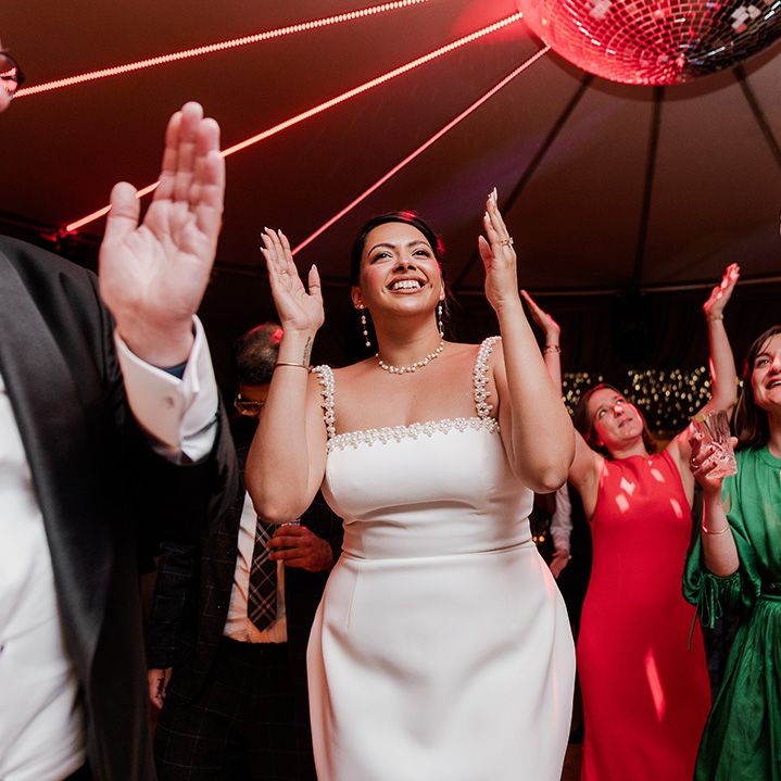 bride-changes-into-wedding-reception-dress