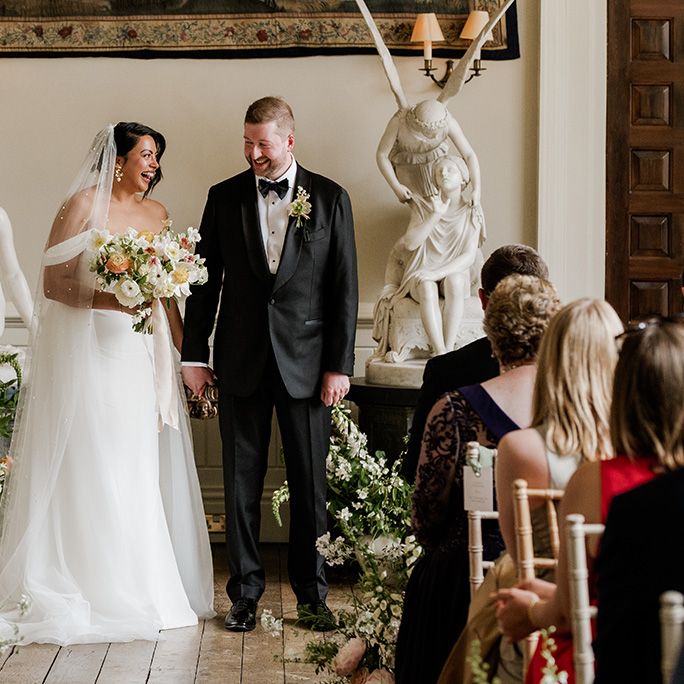 couple-walks-back-down-the-aisle-as-married-couple