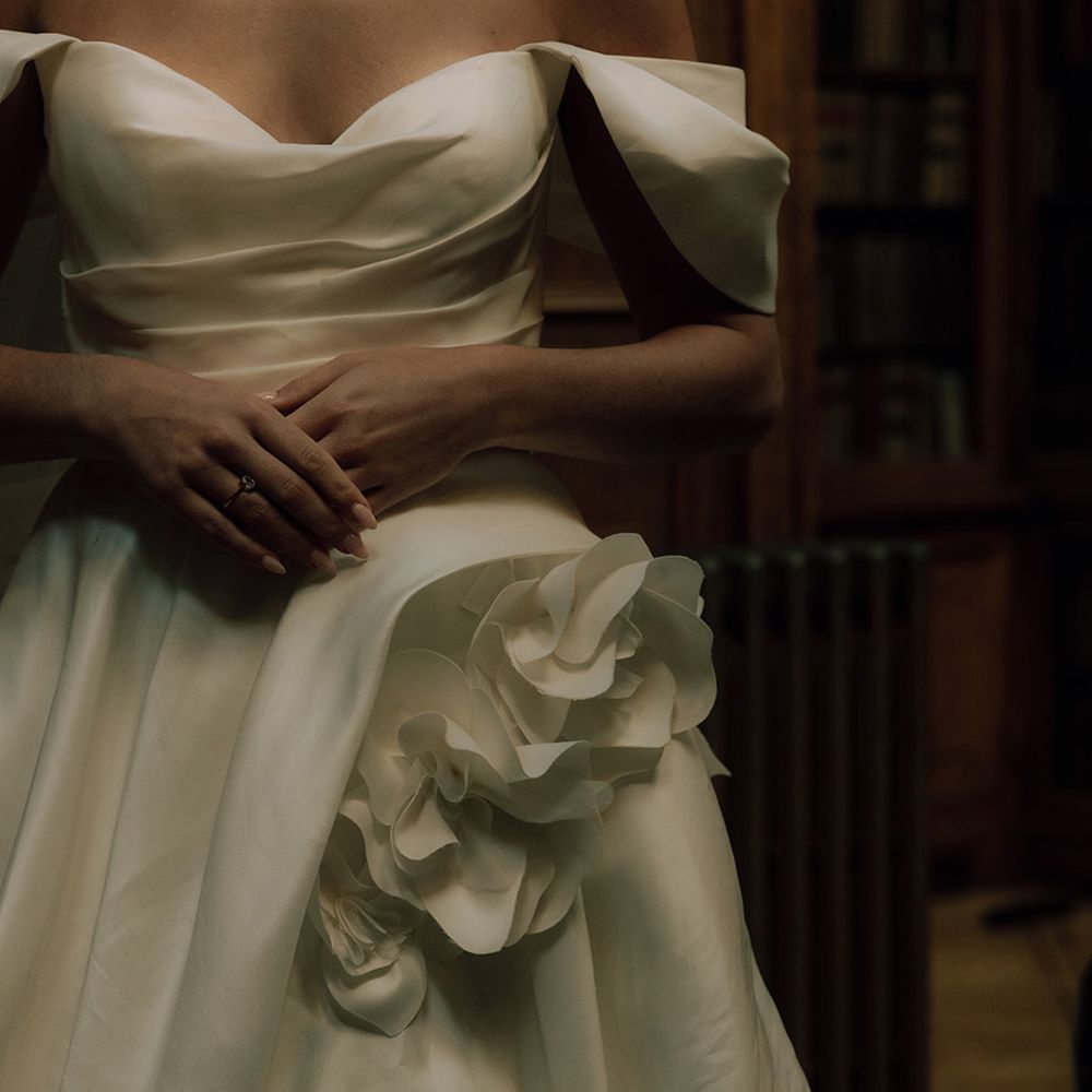 3D floral skirt detail on Jenny Yoo wedding dress