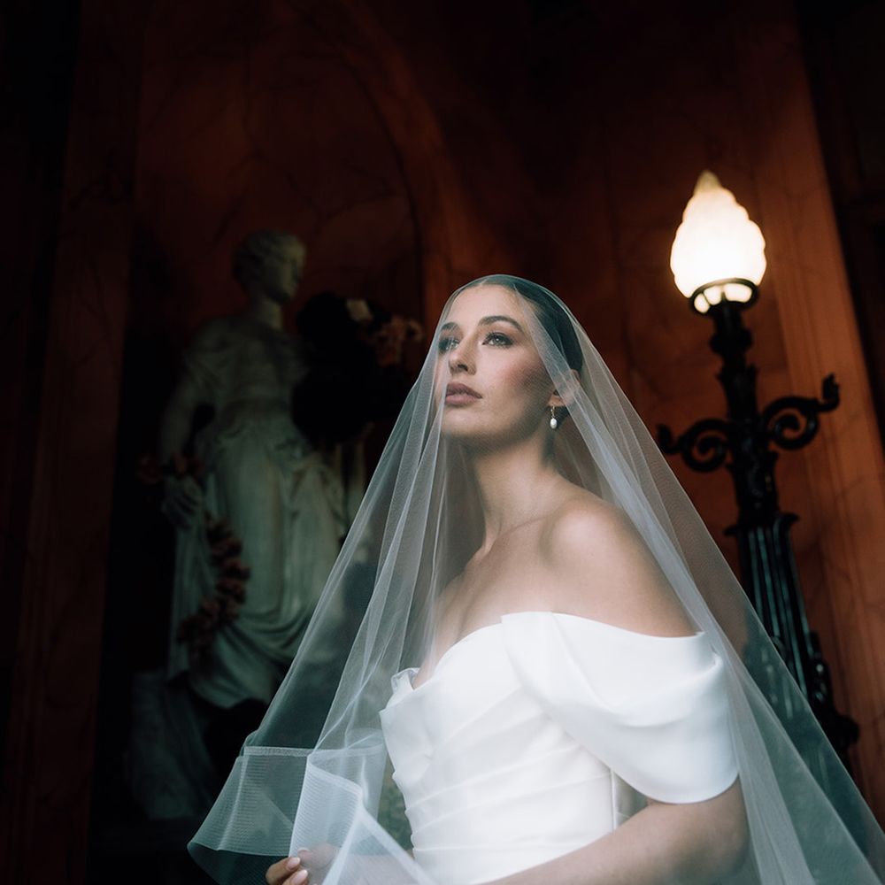 bride-in-off-the-shoulder-jenny-yoo-dress-with-veil