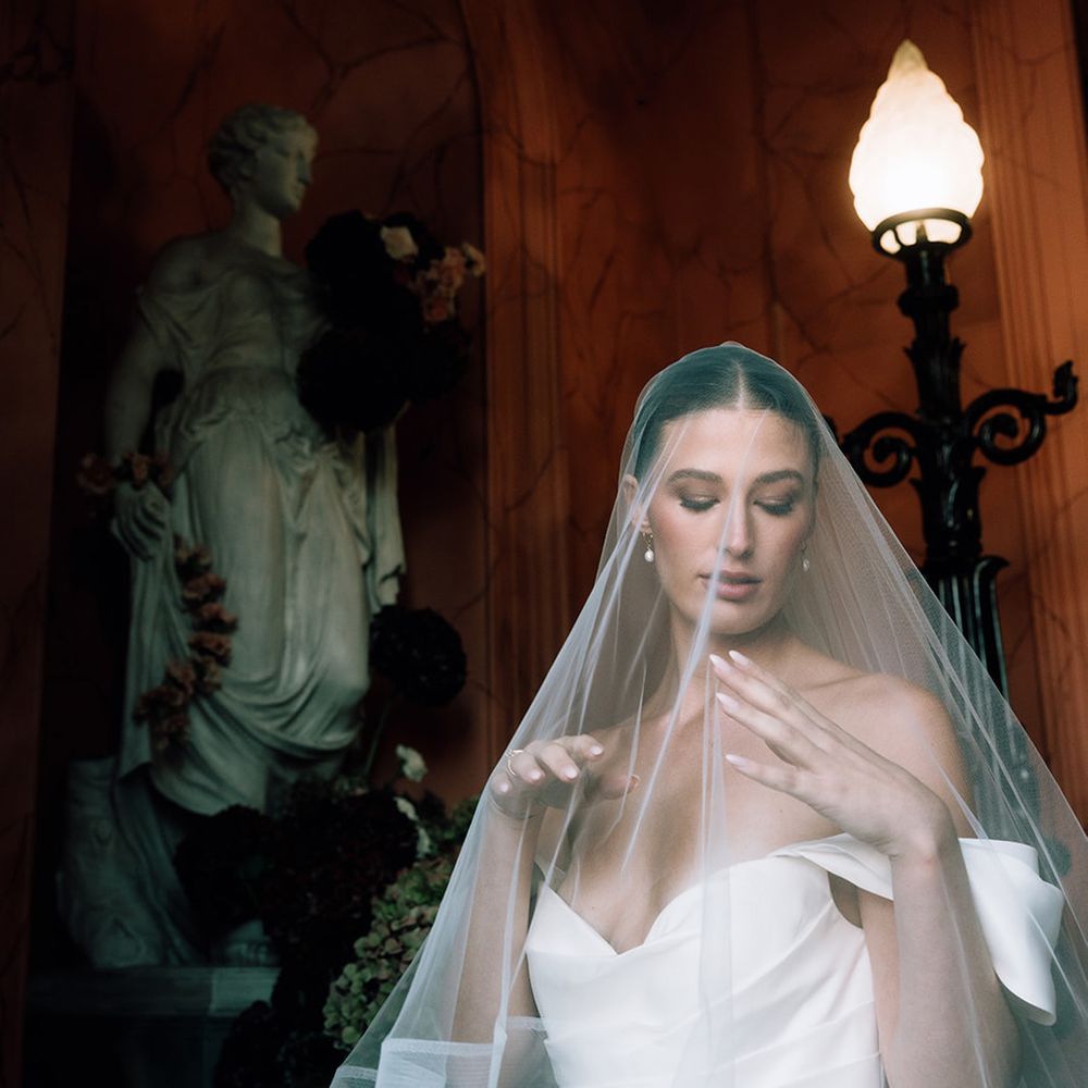 Bride wearing classic wedding veil 