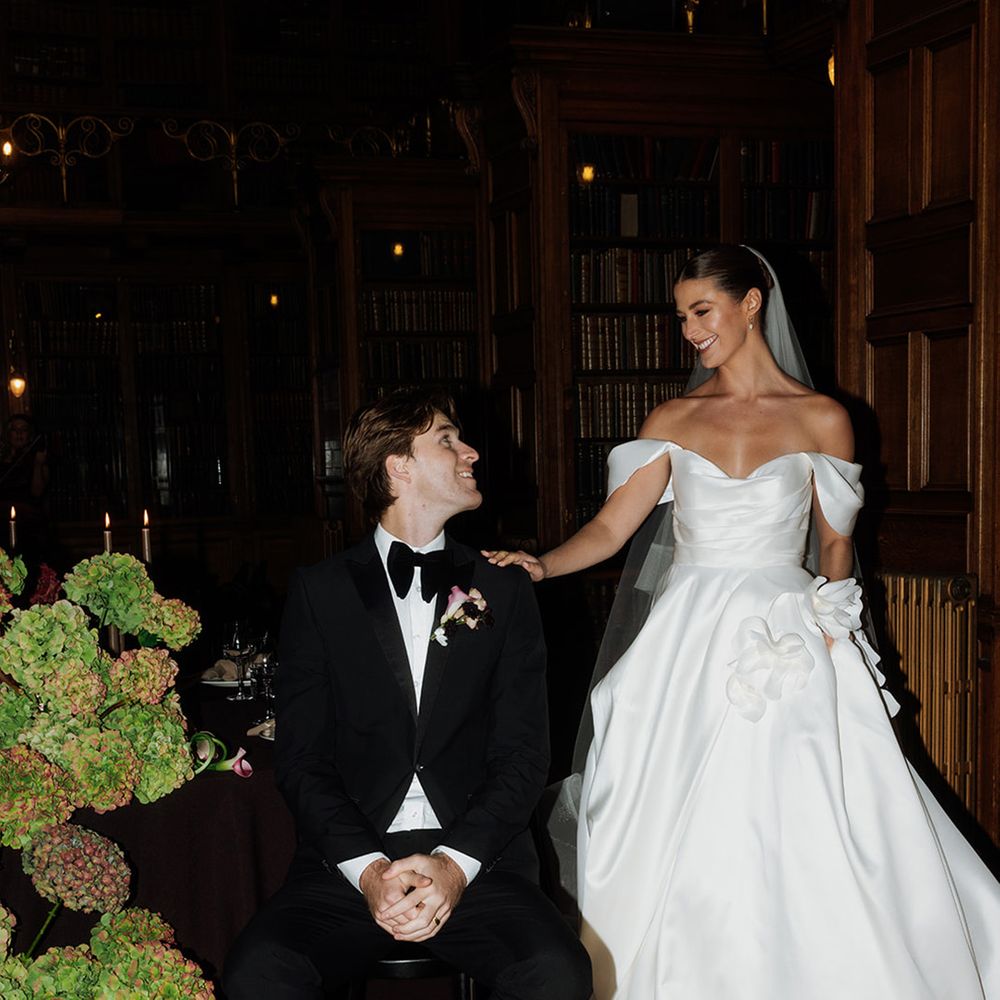 Flash photo of the couple at wedding breakfast