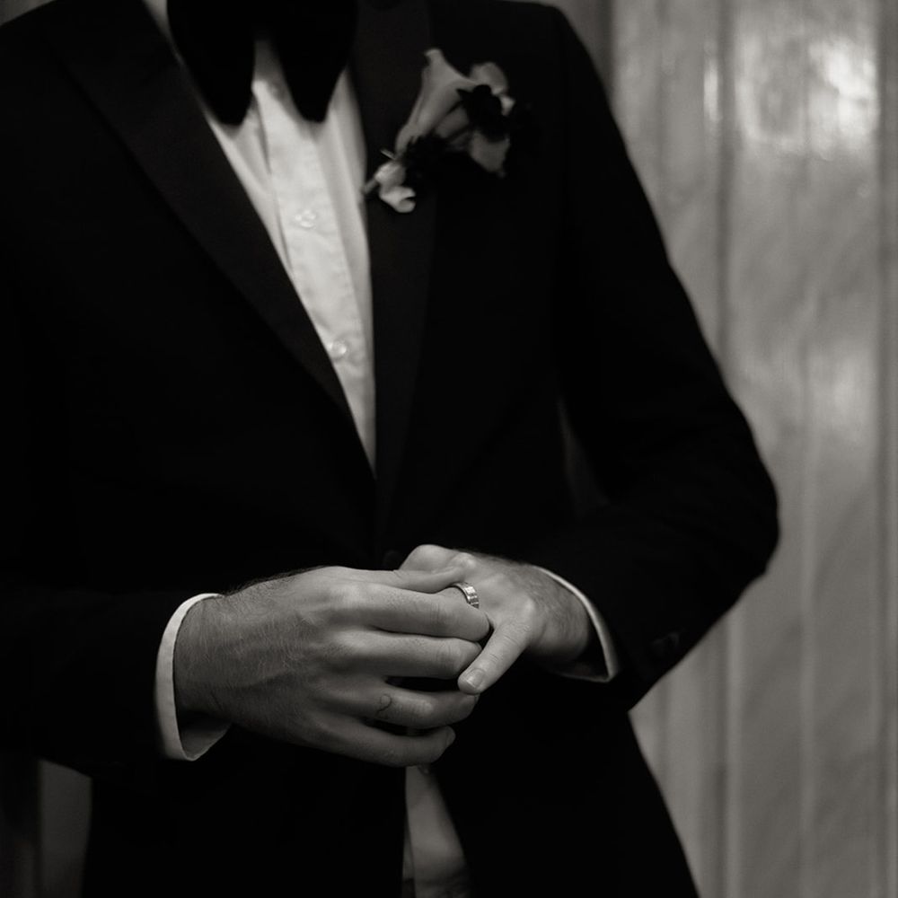 groom-plays-with-new-wedding-ring