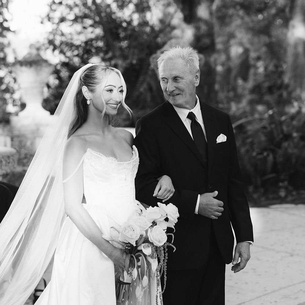 father-of-the-bride-walks-bride-down-the-aisle