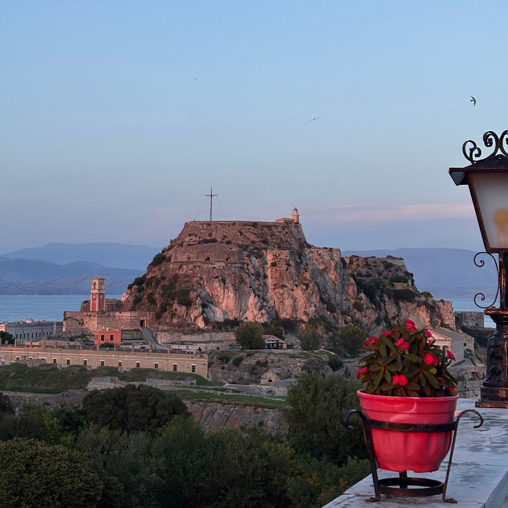 Corfu Old Town view of the Old Fortress at sunset from Cavalieri Roof Garden
