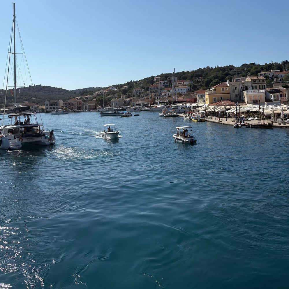 Paxos marina with boats going out to sea