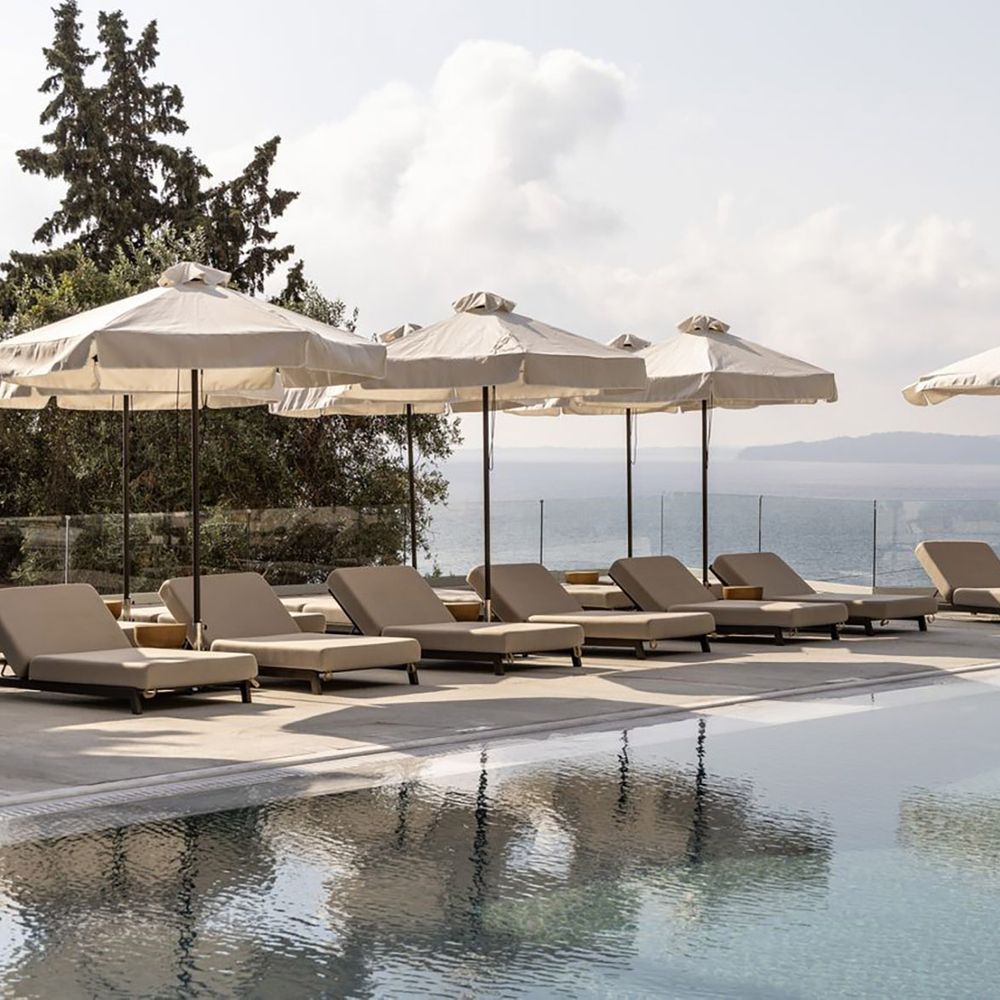 Valmar Corfu main outdoor pool with sun loungers and sea view