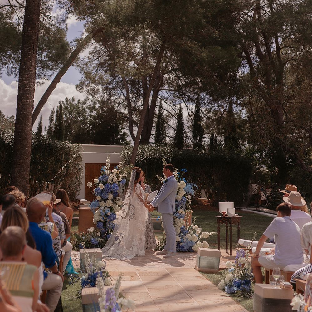 blue-flowers-lining-wedding-aisle-at-ibiza-wedding