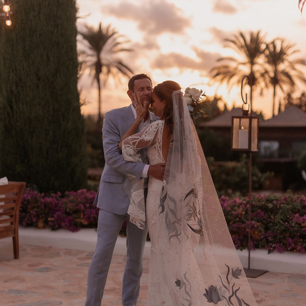 golden-hour-couple-photo-with-bride-wearing-unique-wedding-veil