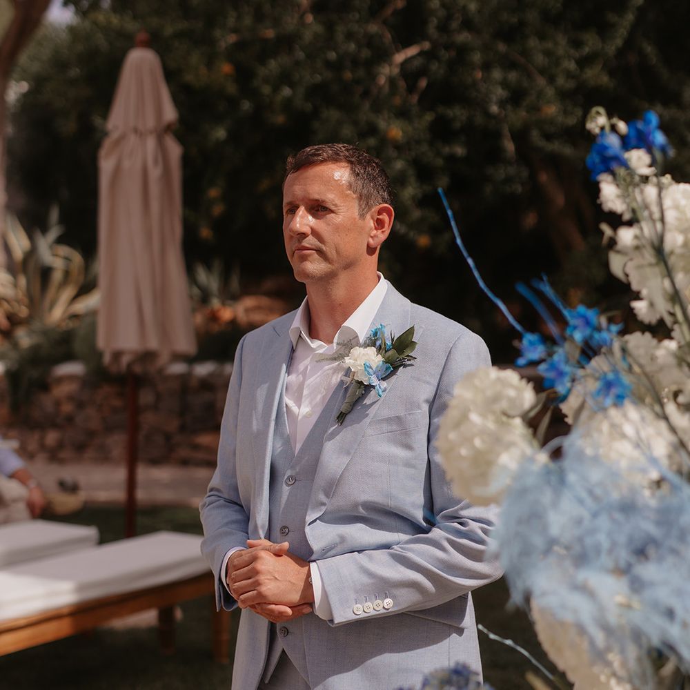groom-in-sky-blue-wedding-suit-at-outdoor-ibiza-wedding