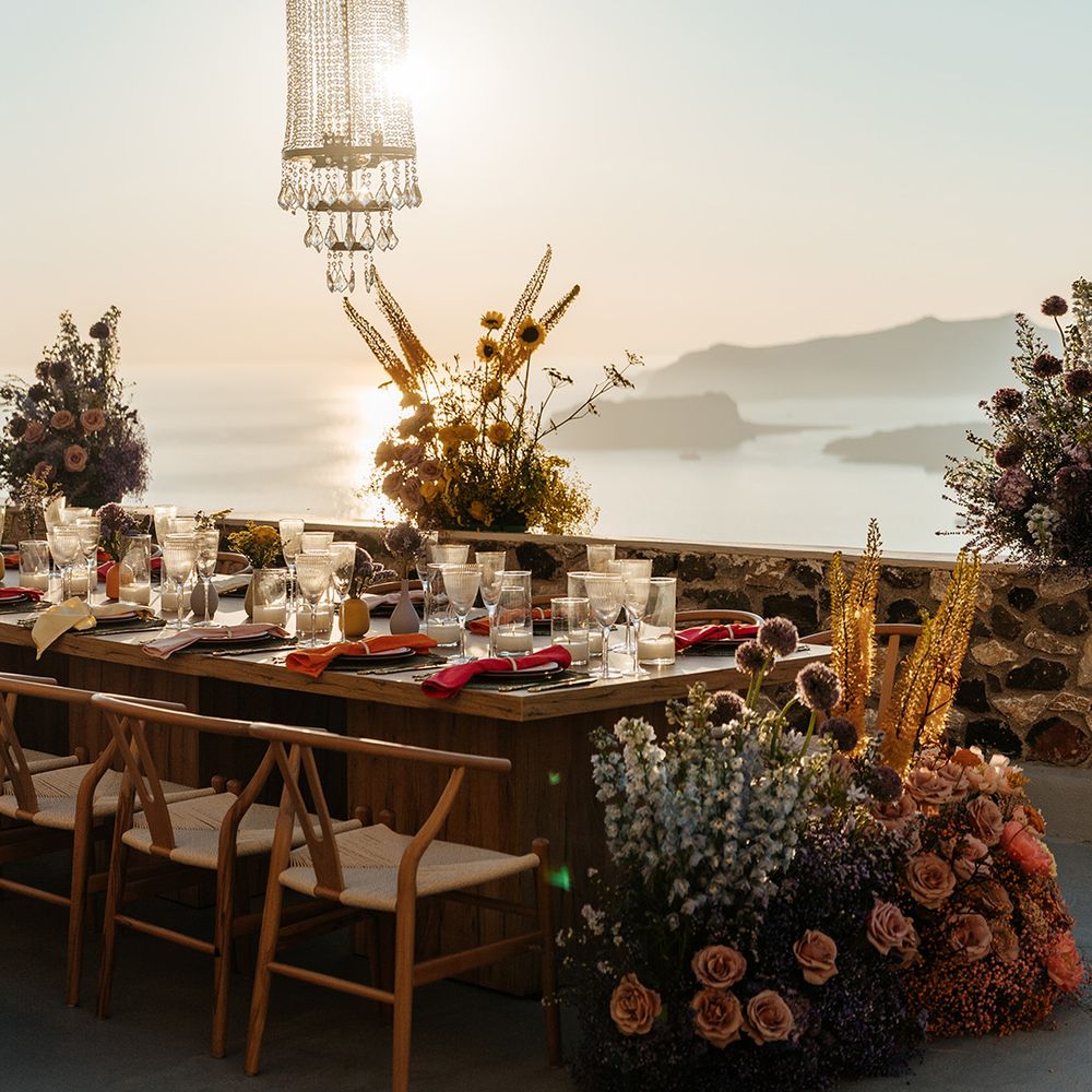 colourful-wedding-flowers-with-crystal-chandeliers-over-tablescape