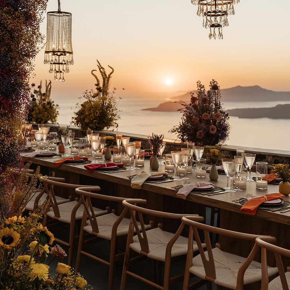 gypsophila-arches-with-chandeliers-over-outdoor-banquet-table