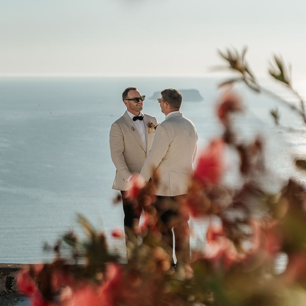 intimate-moment-between-two-grooms-at-greece-destination-wedding