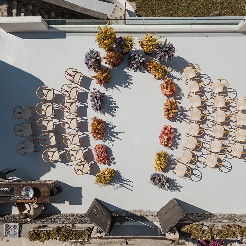 outdoor-wedding-ceremony-with-colourful-wedding-flowers