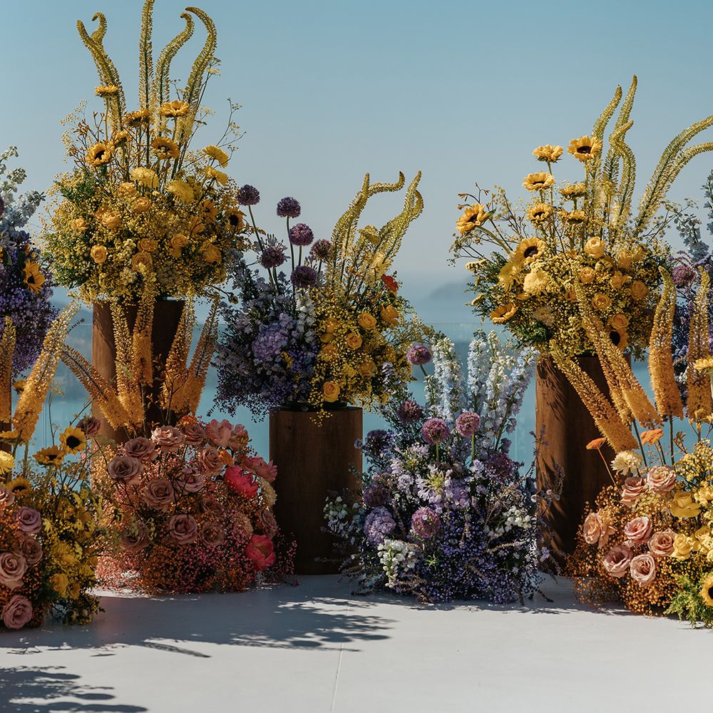 purple-yellow-and-pink-wedding-flower-arrangements