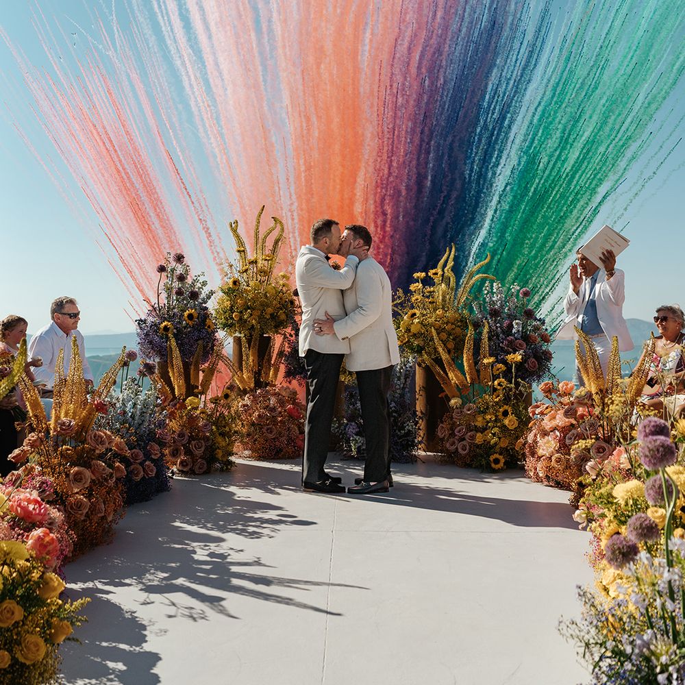 rainbow-smoke-explosion-for-first-kiss-moment-at-santorini-wedding