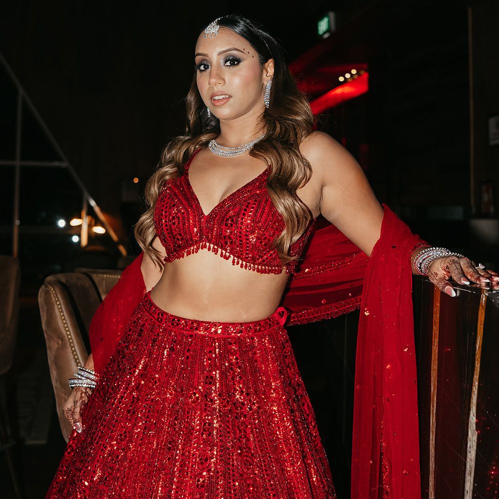 bride-in-sequin-red-lehenga