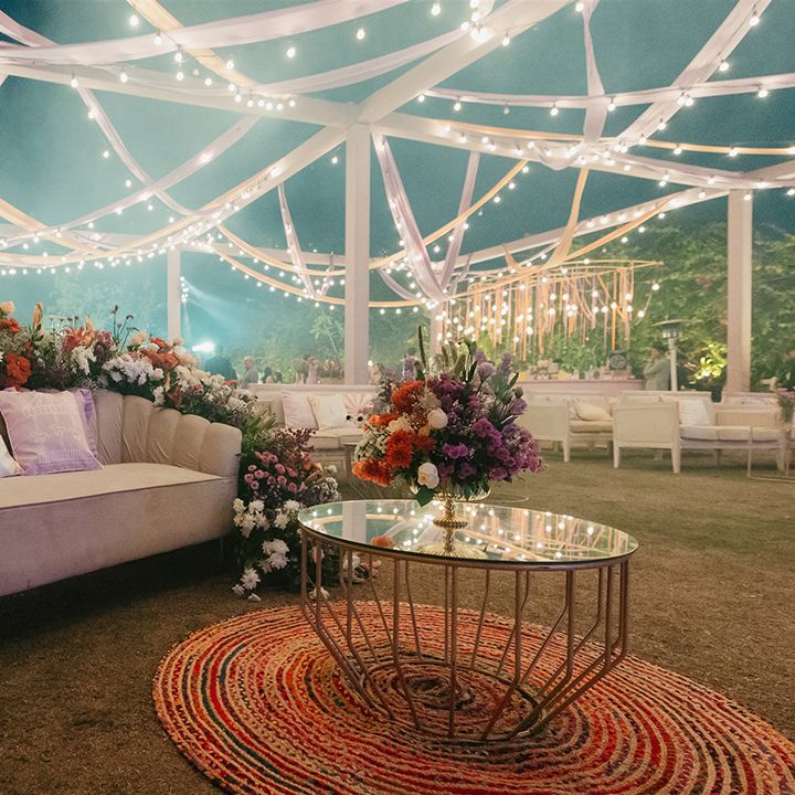 fairy-lights-and-colourful-flowers-at-outdoor-space-for-mehndi