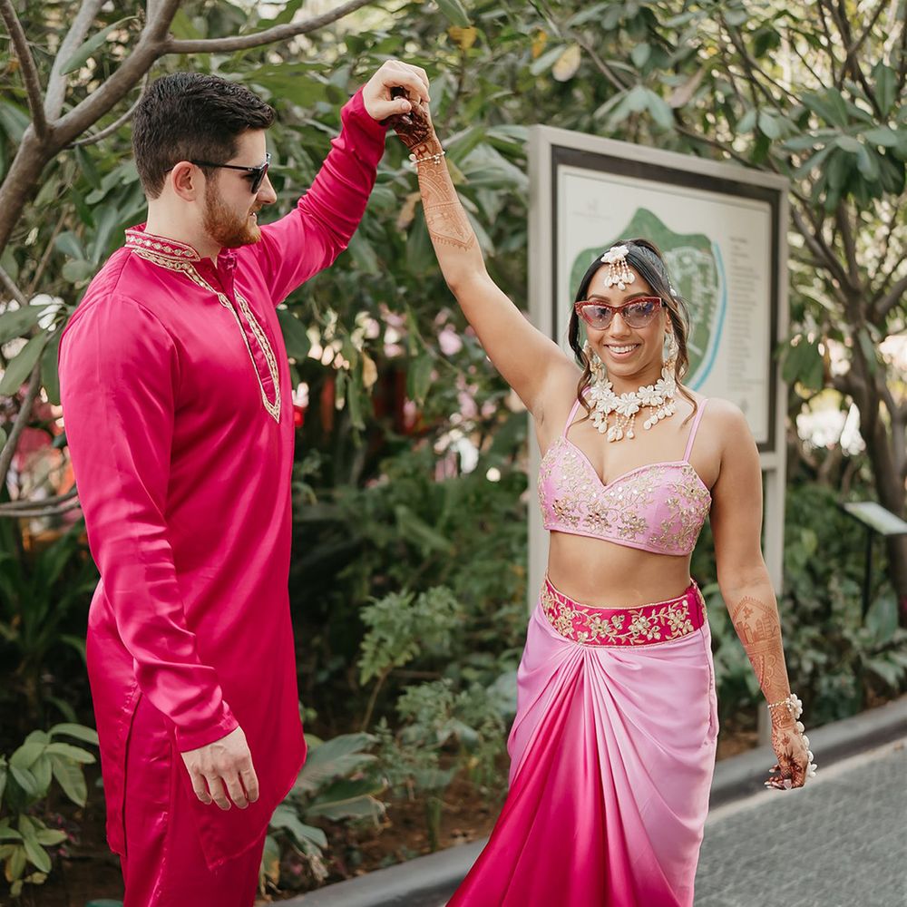 pink-outfits-for-bride-and-groom-at-flamingo-haldi