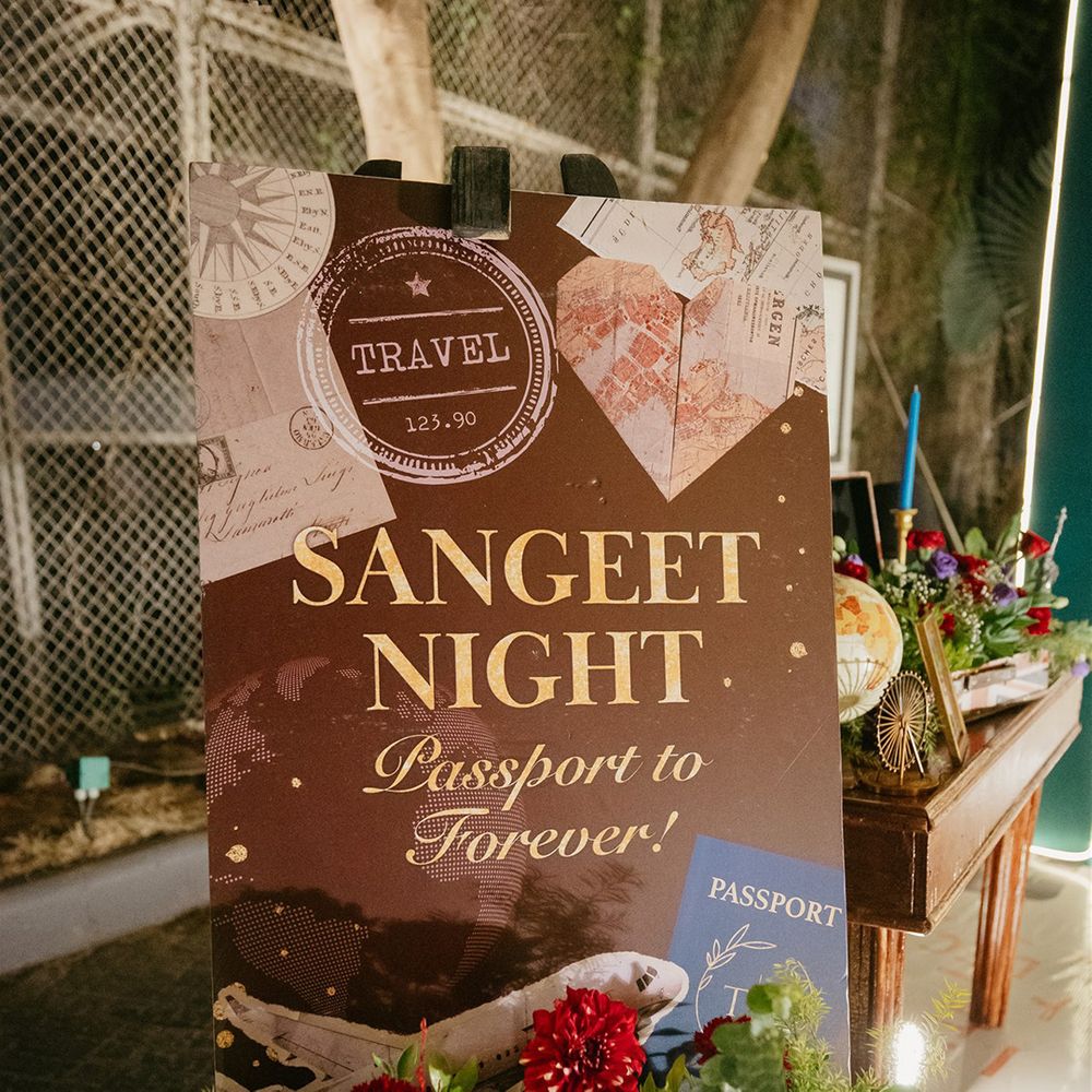 Sangeet night wedding signage with 'around the world' theme