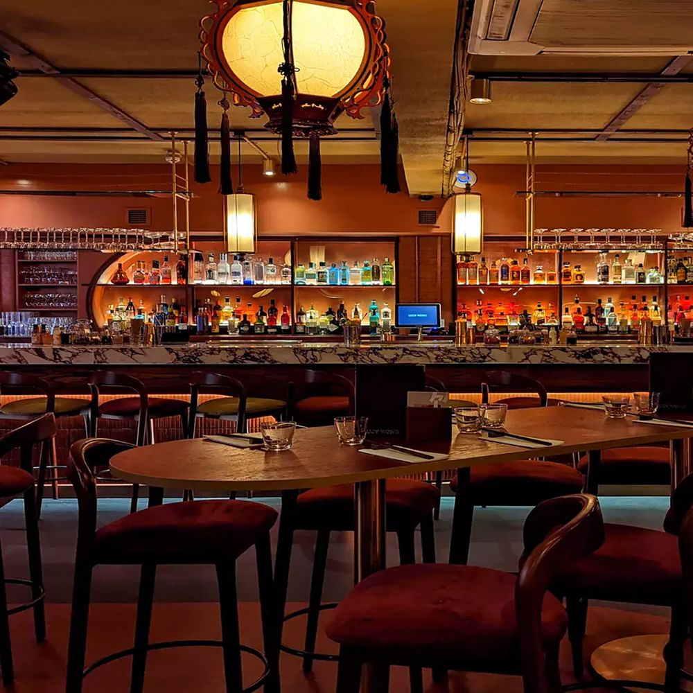 Dimly lit bar at Lucy Long for engagement party celebrations