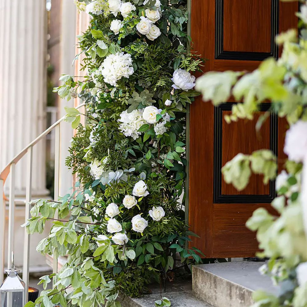 Pitzhanger Manor Gallery engagement party venue entrance with florals