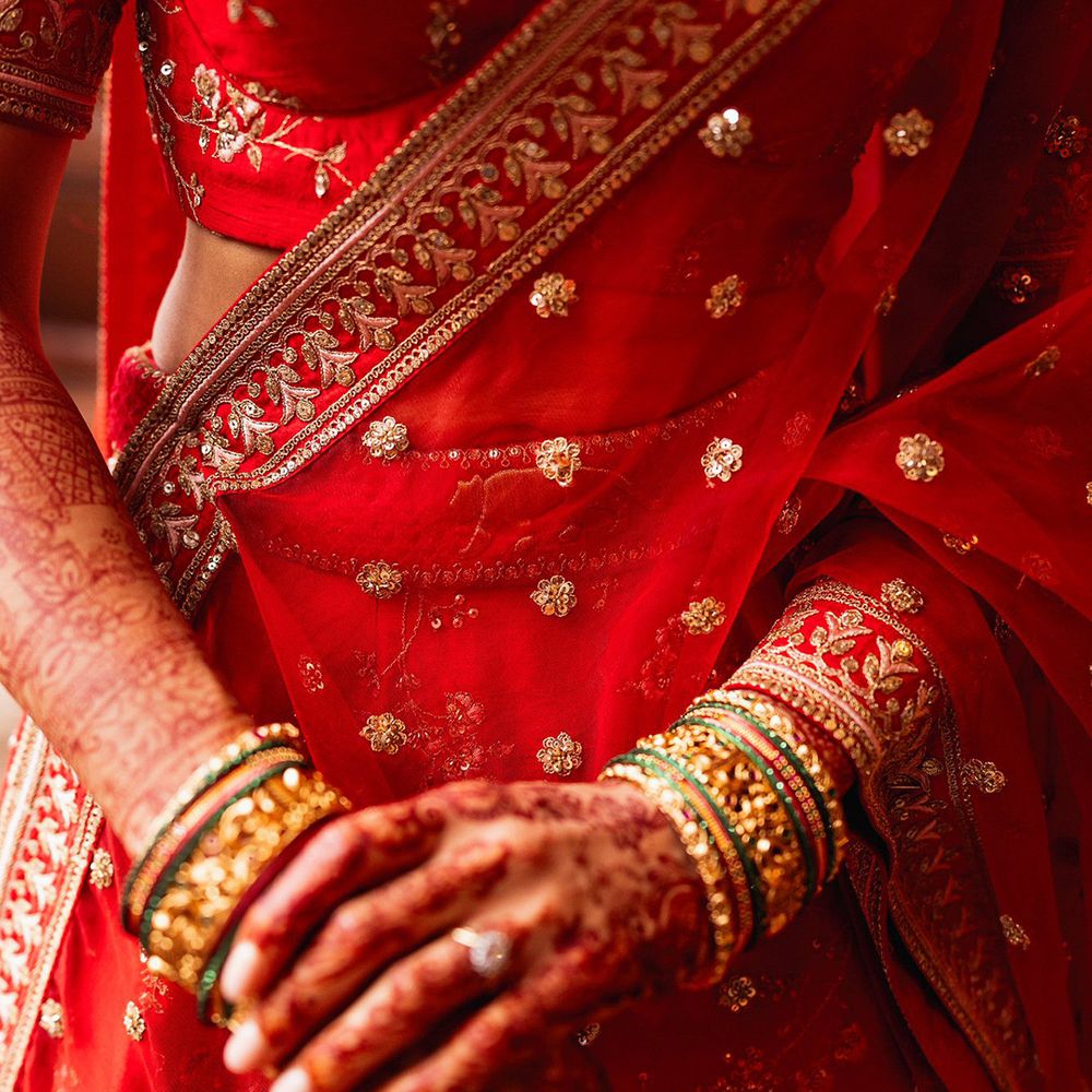 deep-red-and-gold-bridal-lehenga-with-gold-jewellery