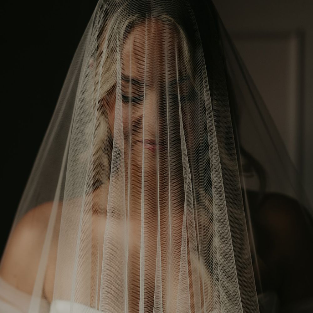 bride-in-strapless-wedding-dress-under-wedding-veil