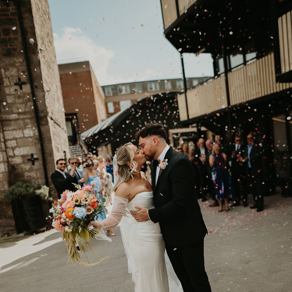 couple-kisses-at-the-shack-revolution-wedding