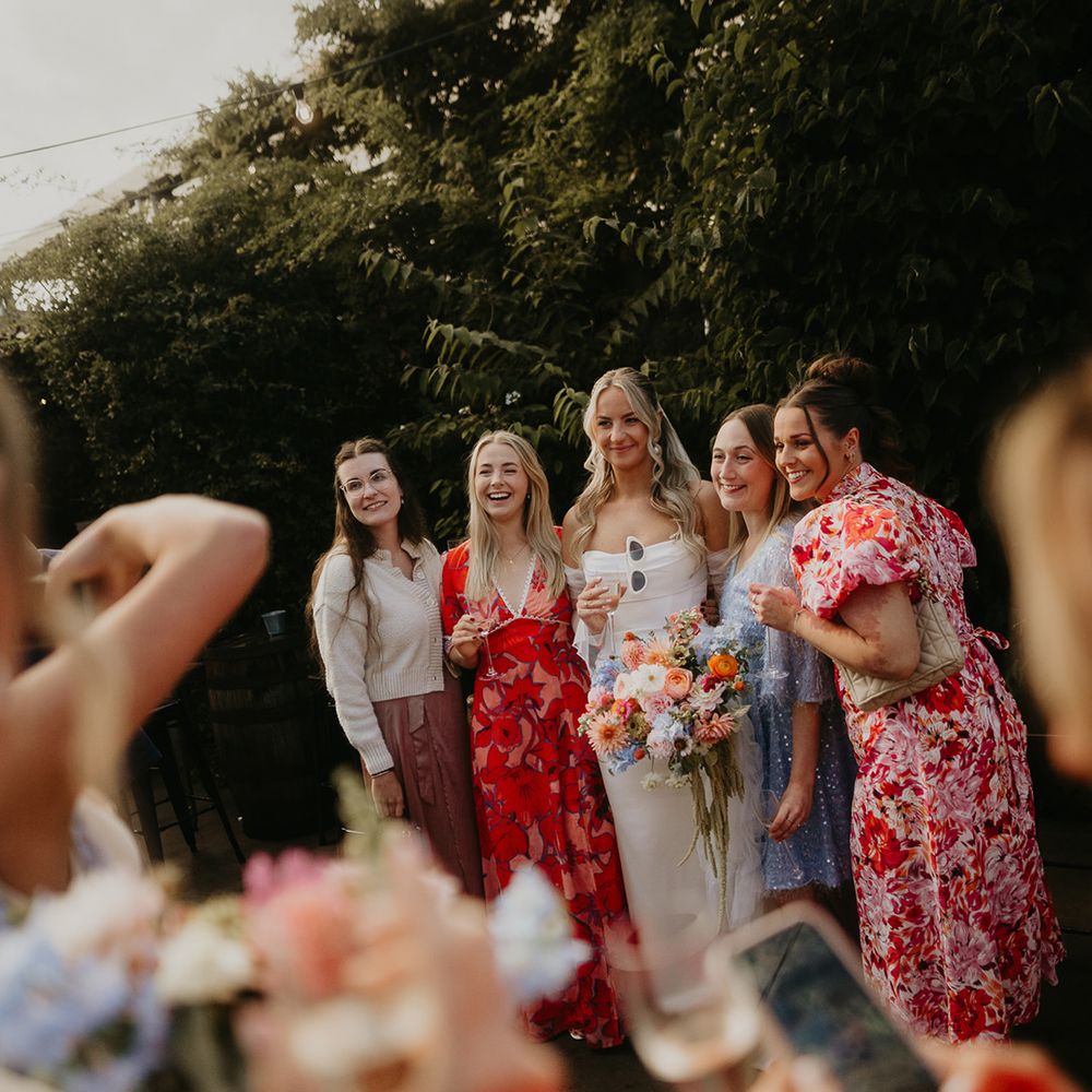 wedding-guests-pose-for-photos