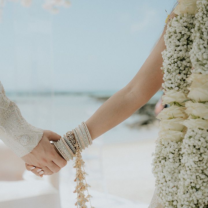 bride-and-groom-holding-hands-for-their-wedding-ceremony