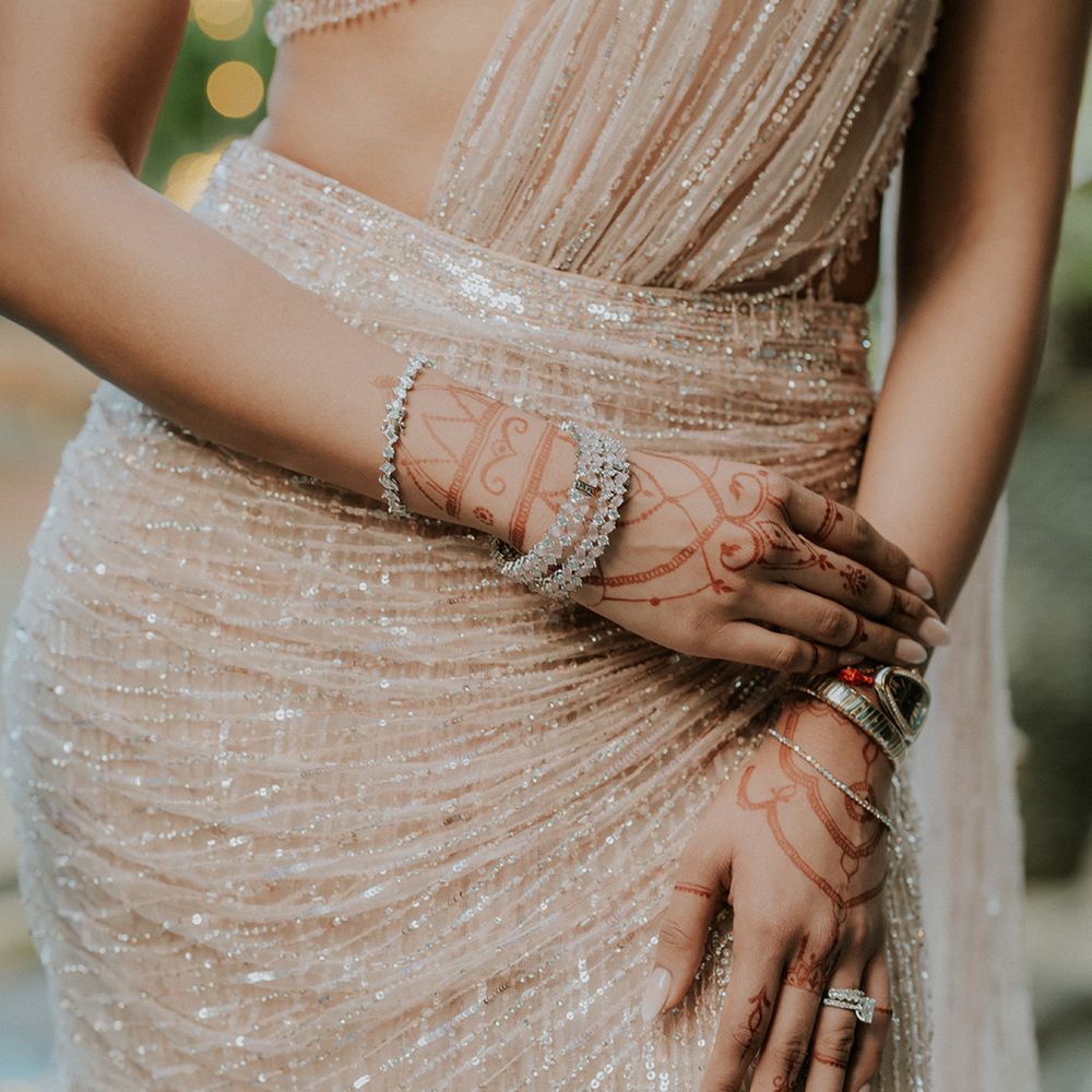 bride-in-sparkly-outfit-with-diamond-tennis-braclets