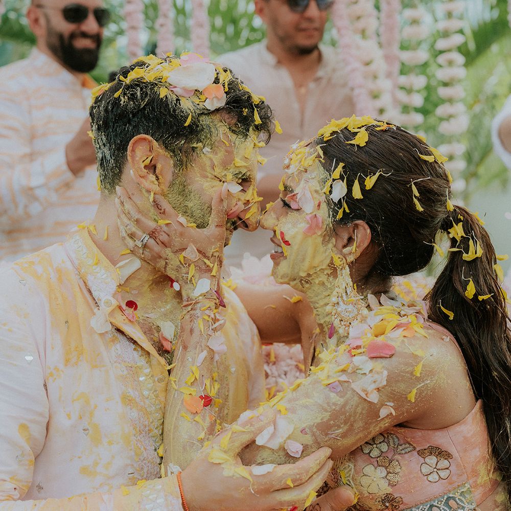 couple-embraces-for-haldi-ceremony