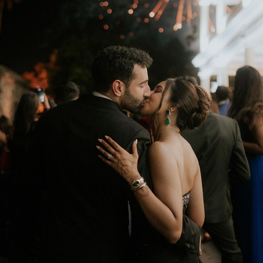 couple-kisses-as-fireworks-explode