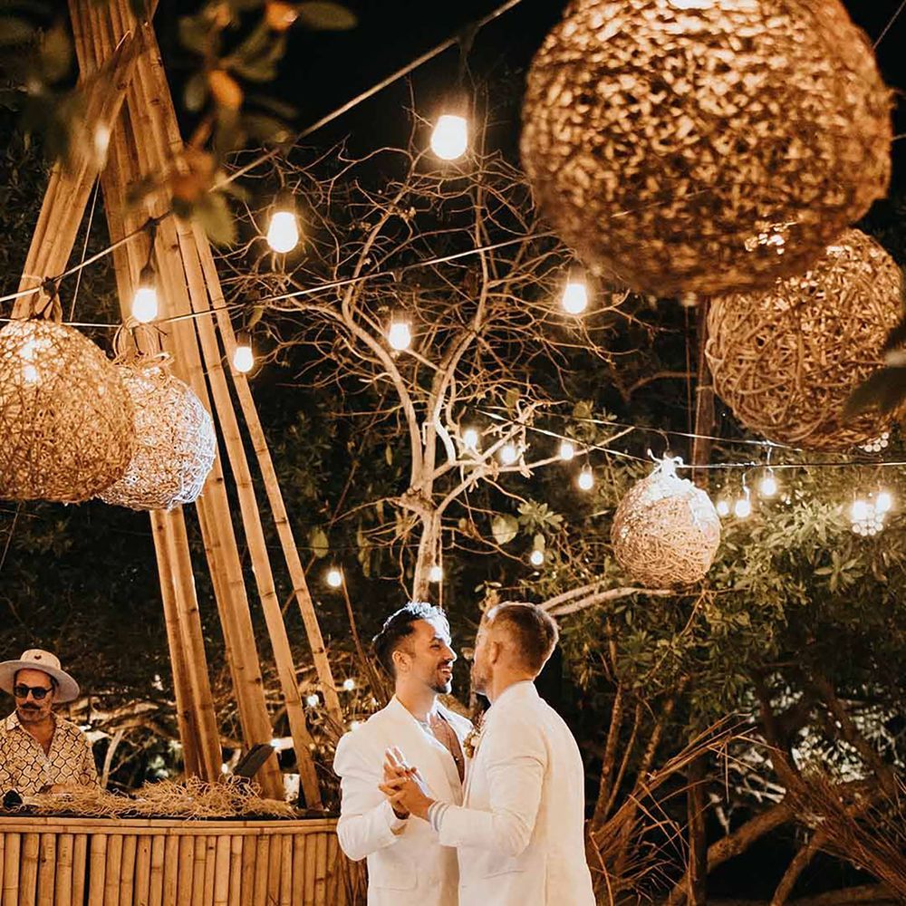 Two grooms first dance at destination wedding in Mexico