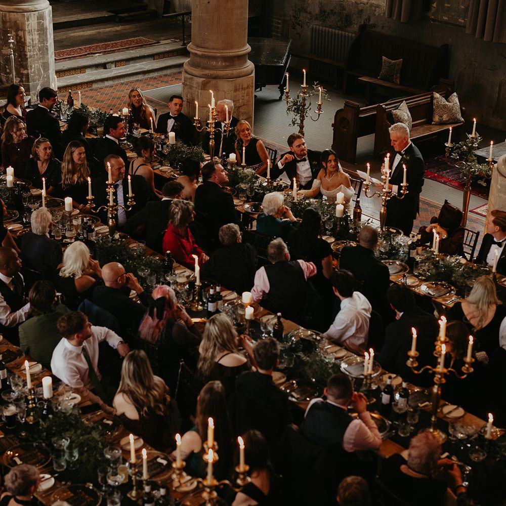 wedding-guests-listening-to-wedding-speeches