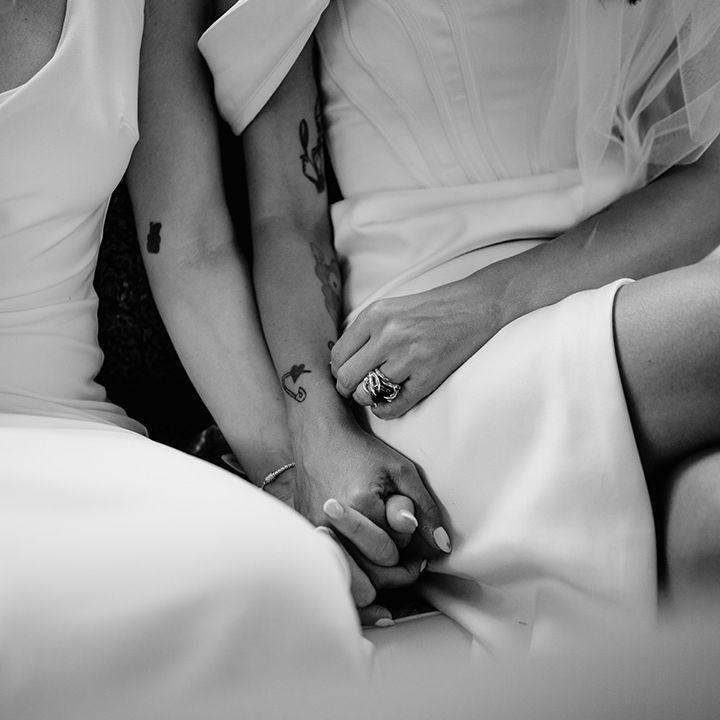 brides-holding-hands