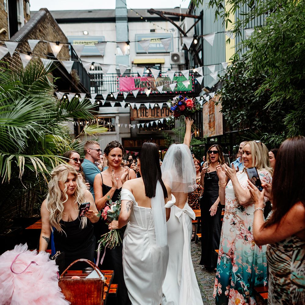 brides-walking-into-wedding-breakfast