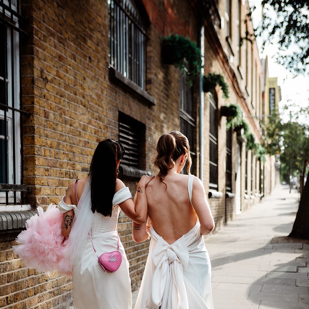 brides-walking-together-at-london-wedding