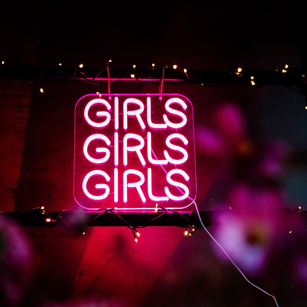 girls-pink-neon-signage