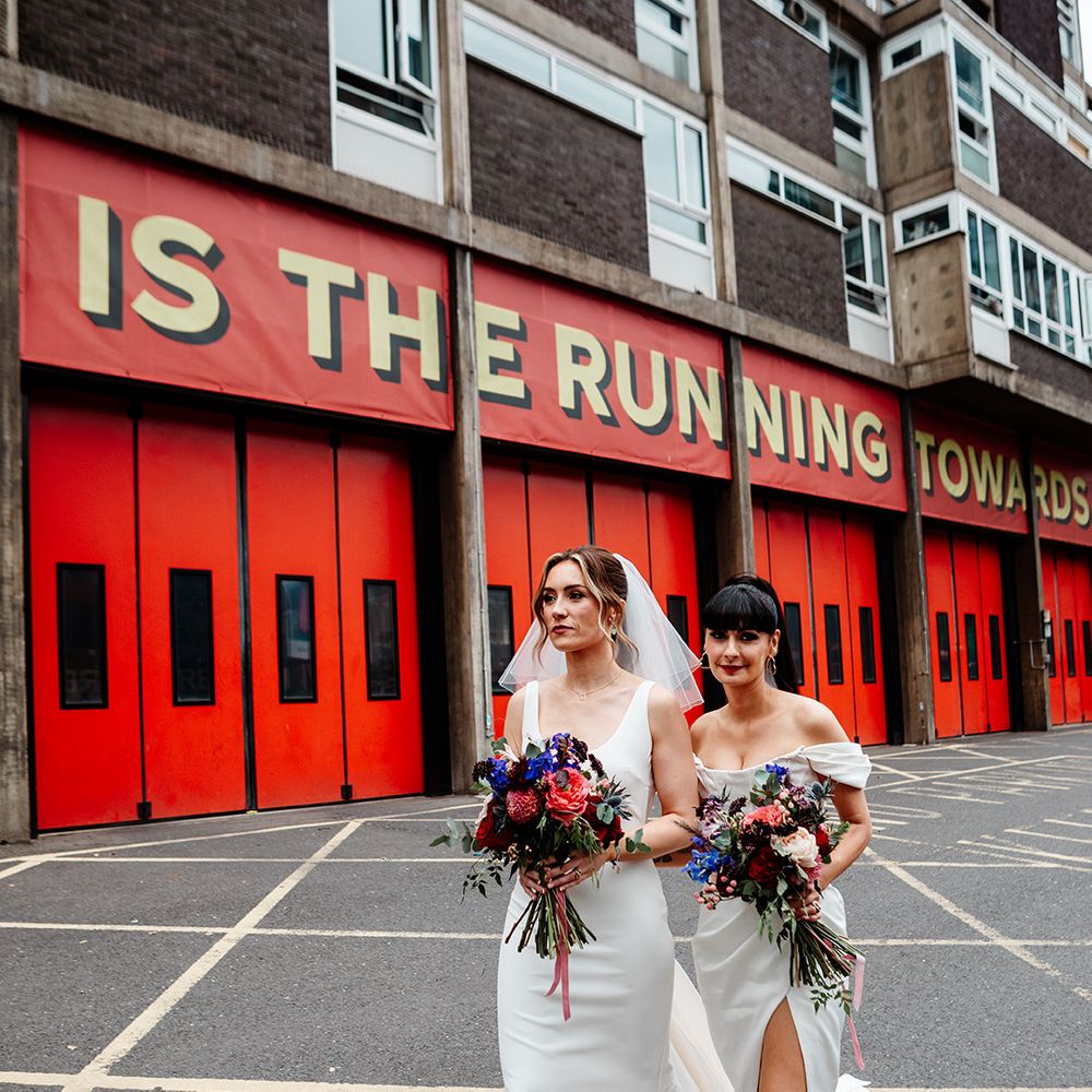 two-brides-walk-together-across-london-for-town-hall-wedding