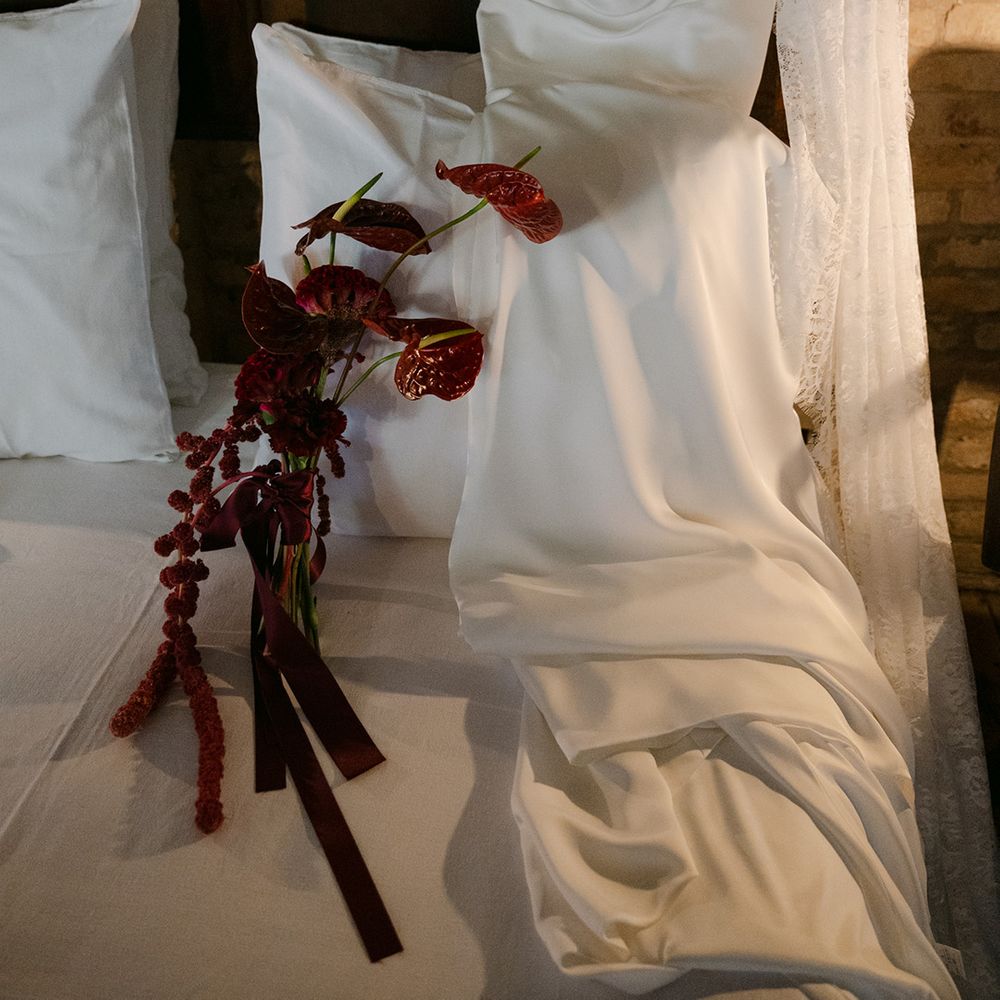 burgundy-red-wedding-bouquet-with-strapless-wedding-dress