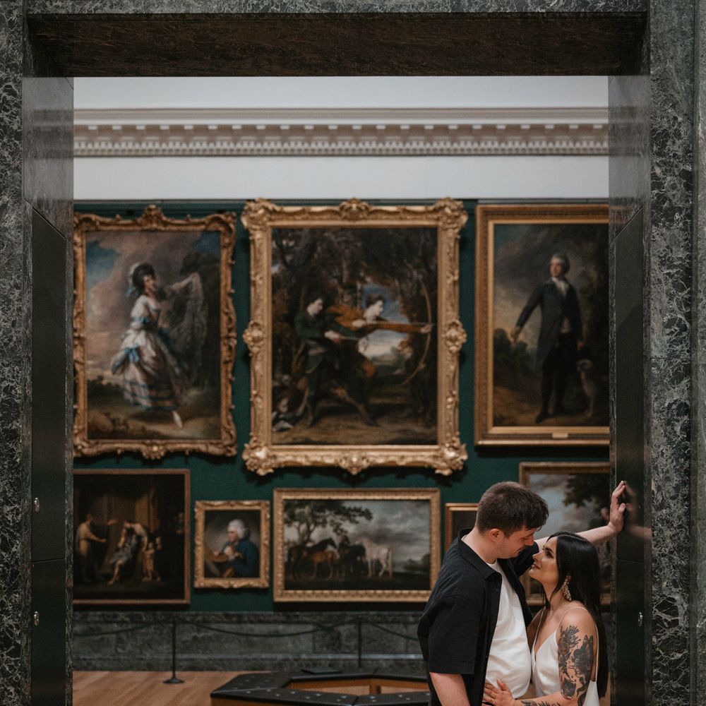 Couple pose for their engagement shoot at Tate Britan