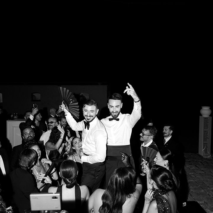 grooms-dancing-at-wedding-reception