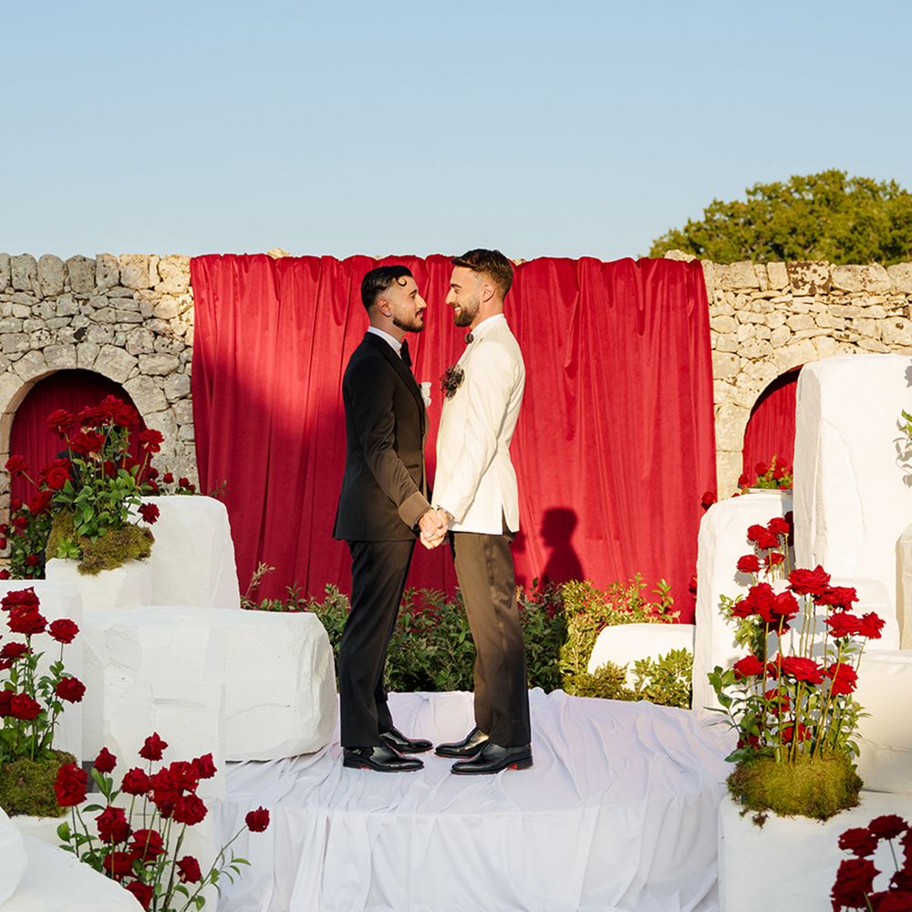 grooms-each-other-for-their-outdoor-wedding-ceremony