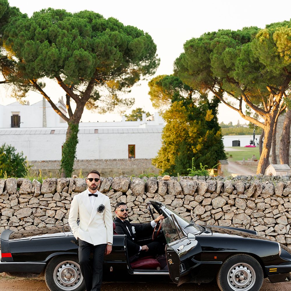 grooms-with-their-vintage-wedding-car.